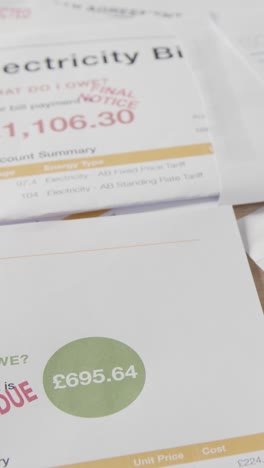 close up vertical video of overdue uk bills for energy