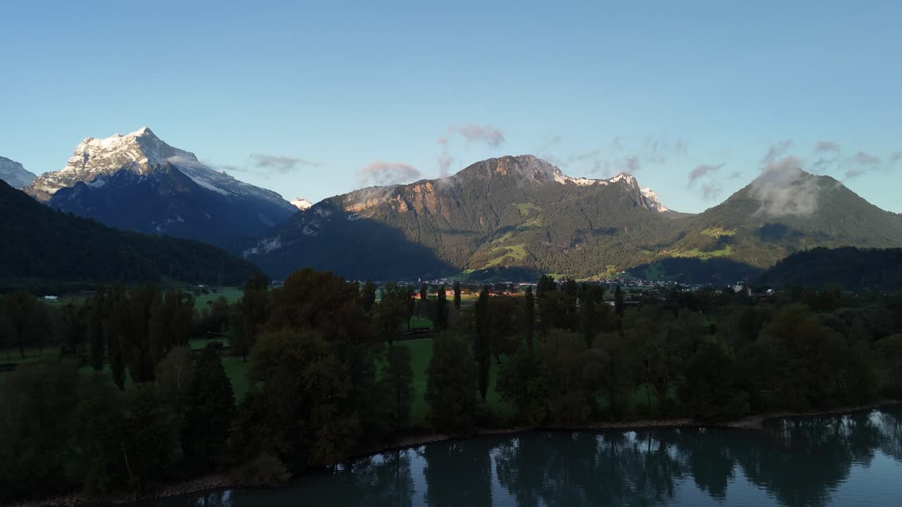 Weesen lake forest reflection, Swiss mountains aerial Switzerland nature