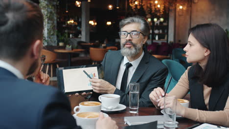 Business Meeting in Cafe