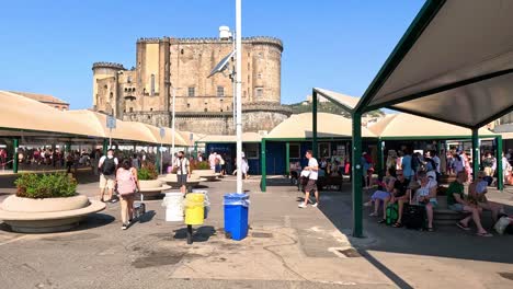 people waiting at sorrento bus station