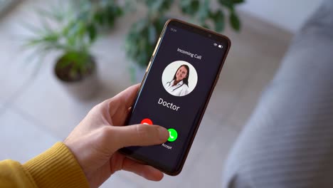 person recived incoming call from doctor. - closeup shot