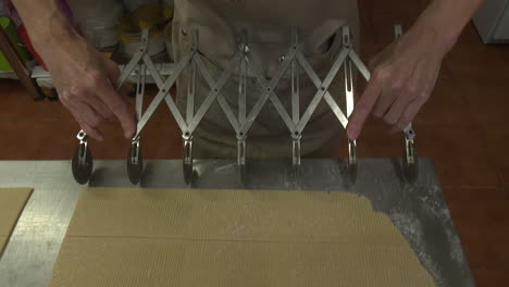 using a pastry cutter to shape cookies
