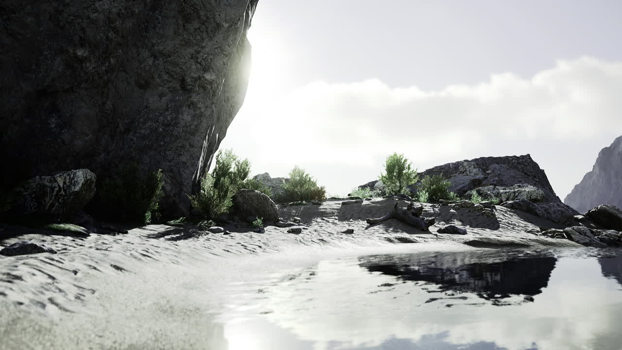 Tranquil waters reflect the sun near rocky cliffs in a serene landscape