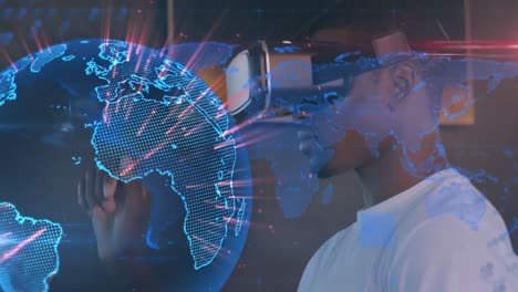 Animation-of-globe-and-world-map-over-african-american-businessman-using-vr-headset