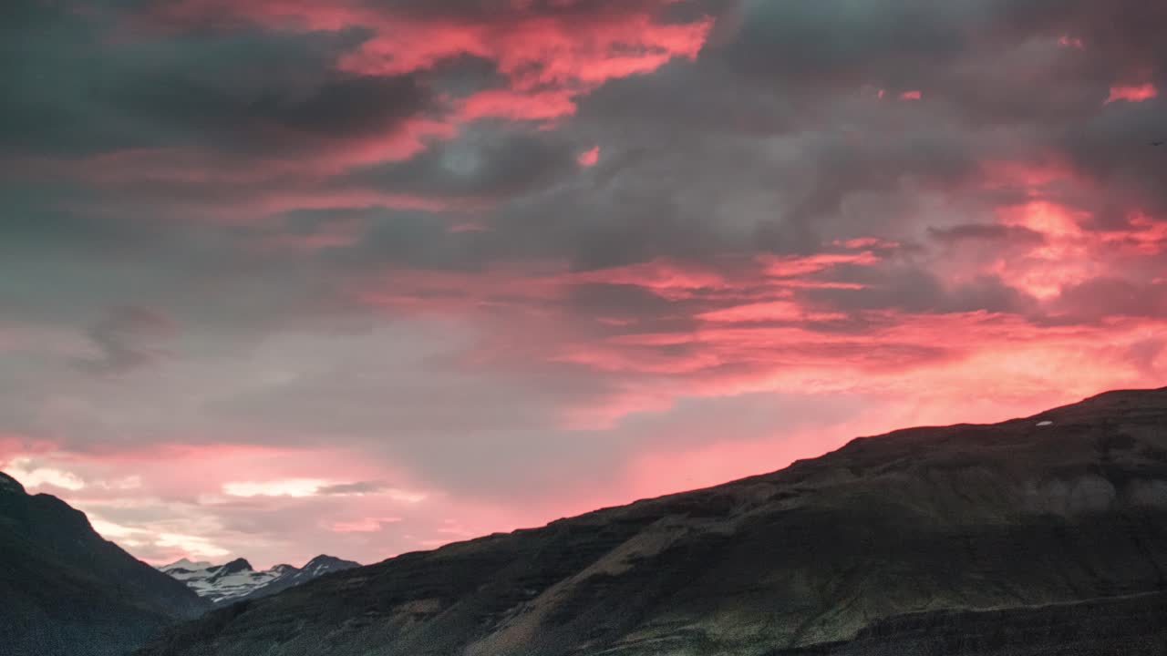 Timelapse Of Clouds Passing By Midnight Sun In South Iceland