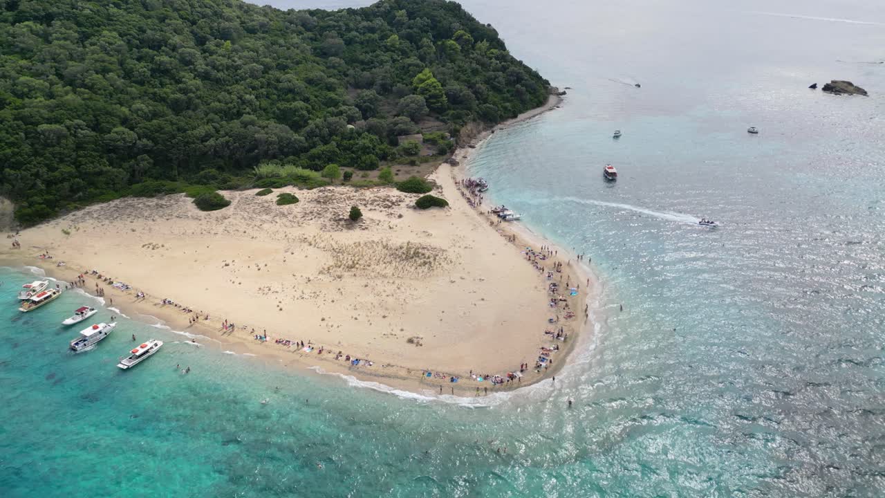 Aerial drone view of Marathonisi island with sandy shore and clear water, Zakynthos, Greece