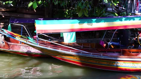 colorful longtail boat in a thai canal