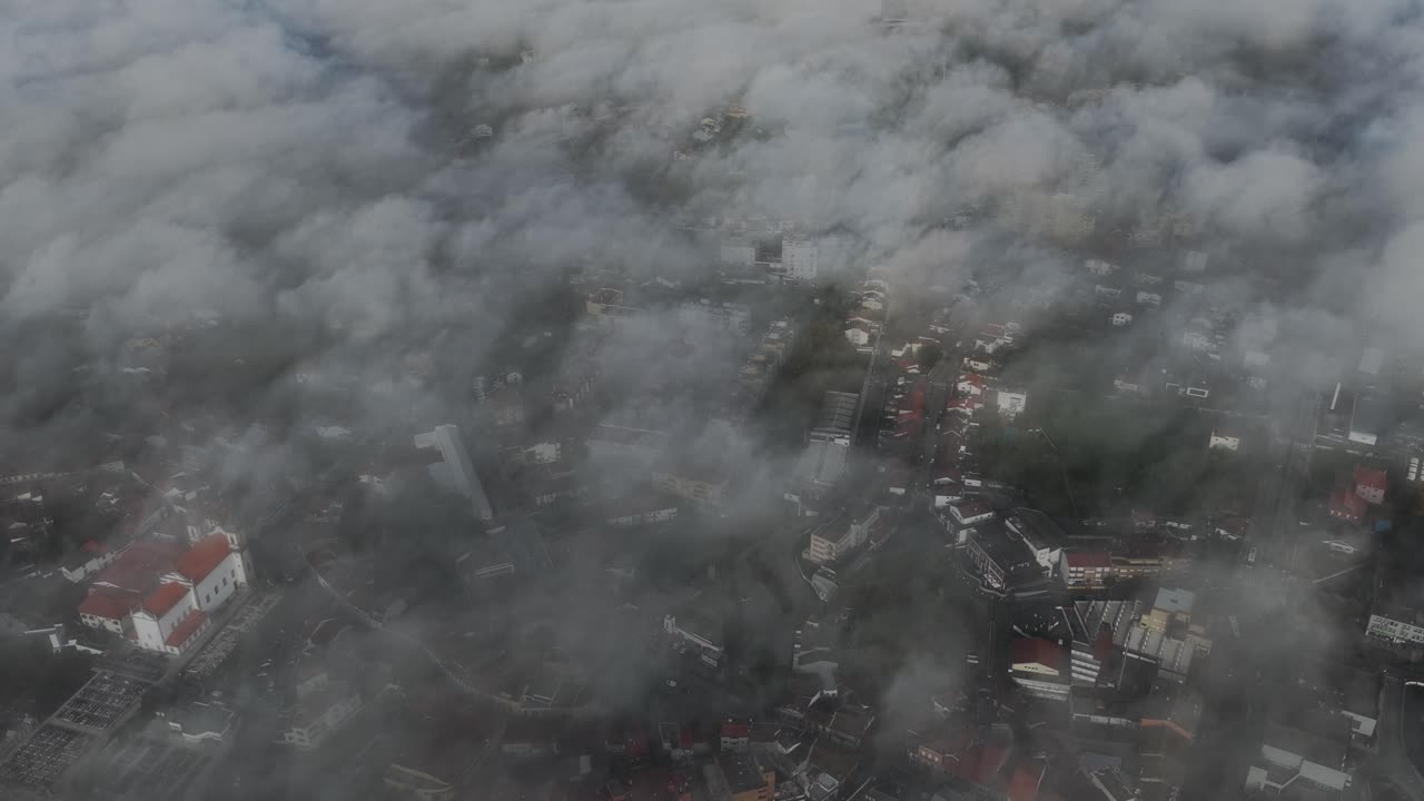 Morning fog clouds over the city of Porto