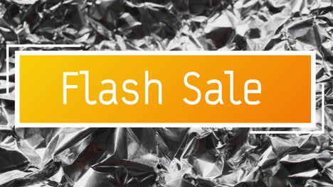 animation of flash sale text over close up of crumpled paper