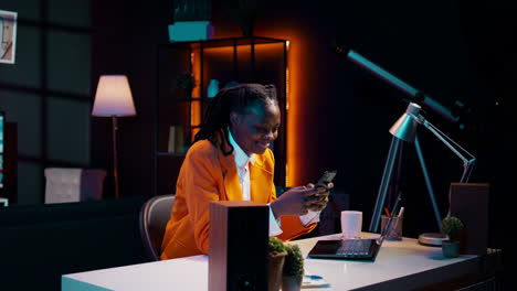 African american girl texting messages on smartphone
