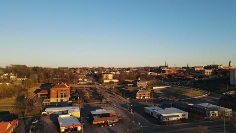 4k flying toward the city of clarksville tennessee during sunset