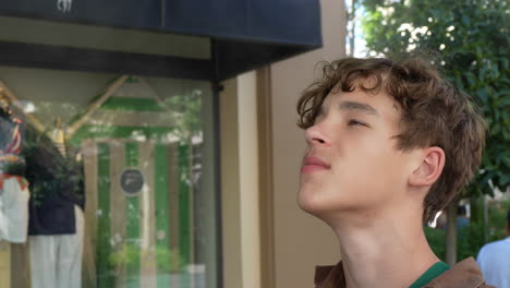 teen enjoying outdoor mist in spain