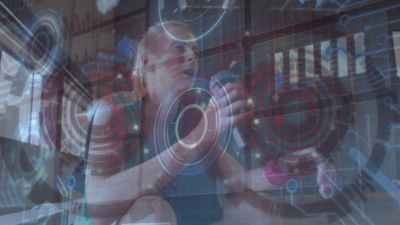 Woman interacting with animation of holographic data on futuristic digital interface