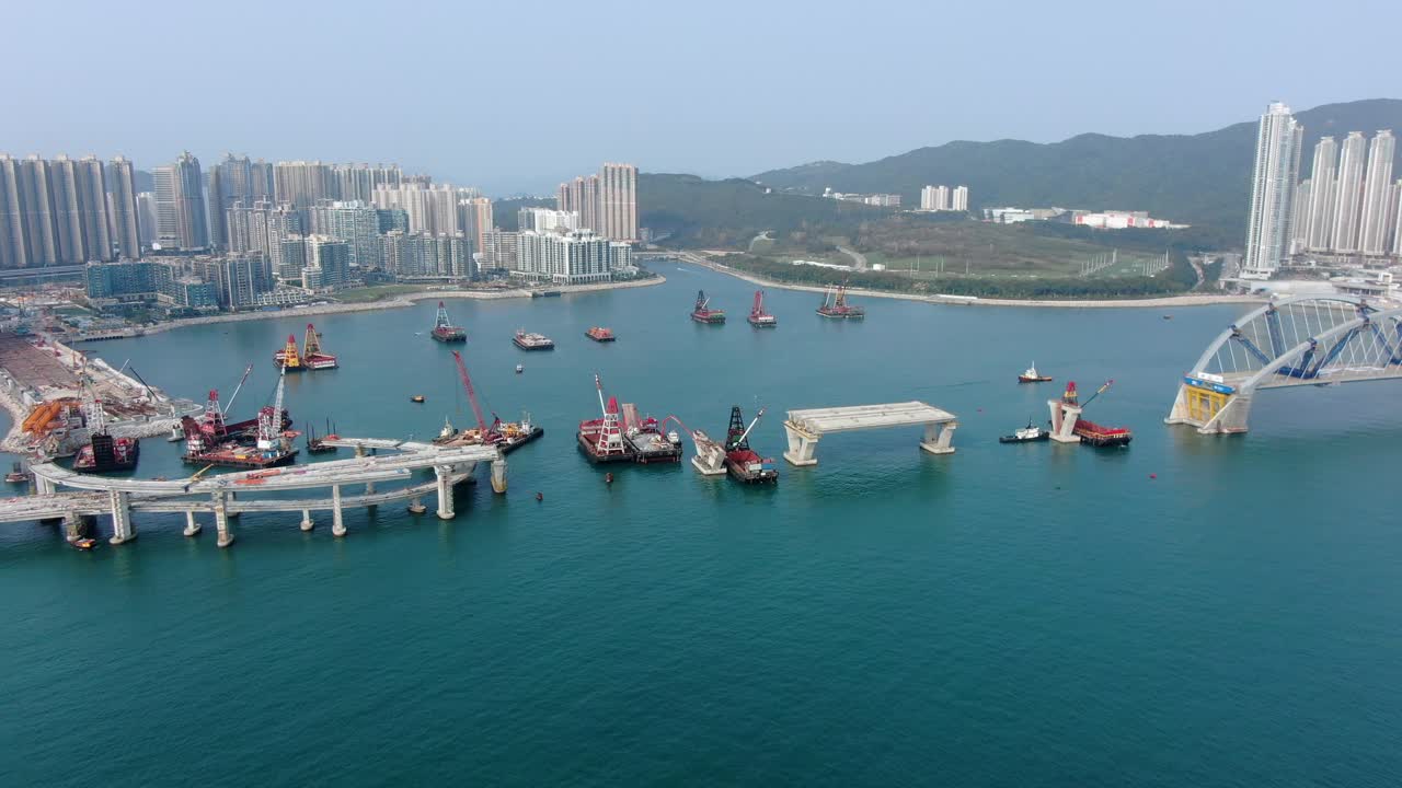 proyecto de construcción del enlace cruzado de la bahía de hong kong, un puente doble de dos carriles que conecta el túnel tseung kwan o lam tin con la carretera wan po, vista aérea