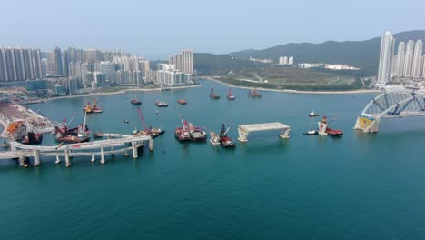 hong kong cross bay link construction project, a dual two-lane bridge connecting tseung kwan o lam tin tunnel to wan po road, aerial view