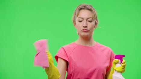 woman cleaning with spray bottle and rag