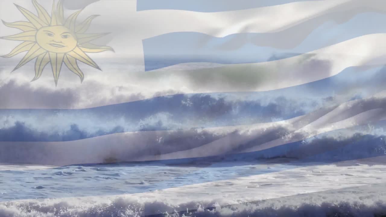 animación de la bandera de uruguay ondeando sobre el paisaje marino de la playa