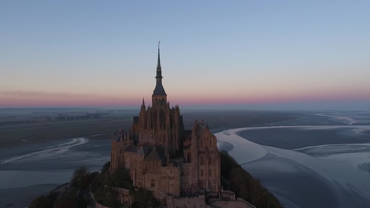 Mont Saint Michel during golden hour at sunset, Normandy in France