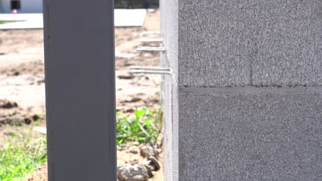 close up of a brick wall while it is under construction