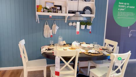 stylish kitchen with table and wall shelves