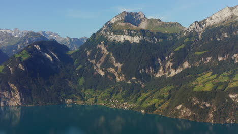 stunning aerial view of swiss alps mountains and lake