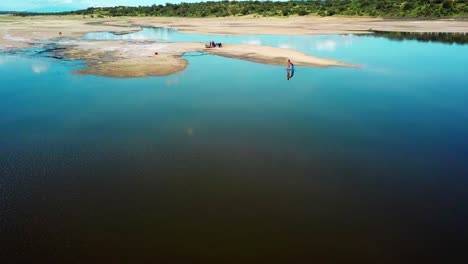 Aerial-View-Of-Tourists-Around-Lake-Magadi-In-Kenya---drone-shot