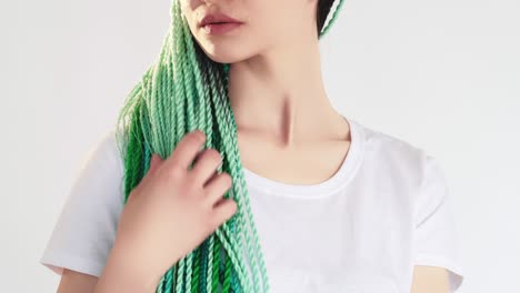 z generation woman blue green colored hair braids