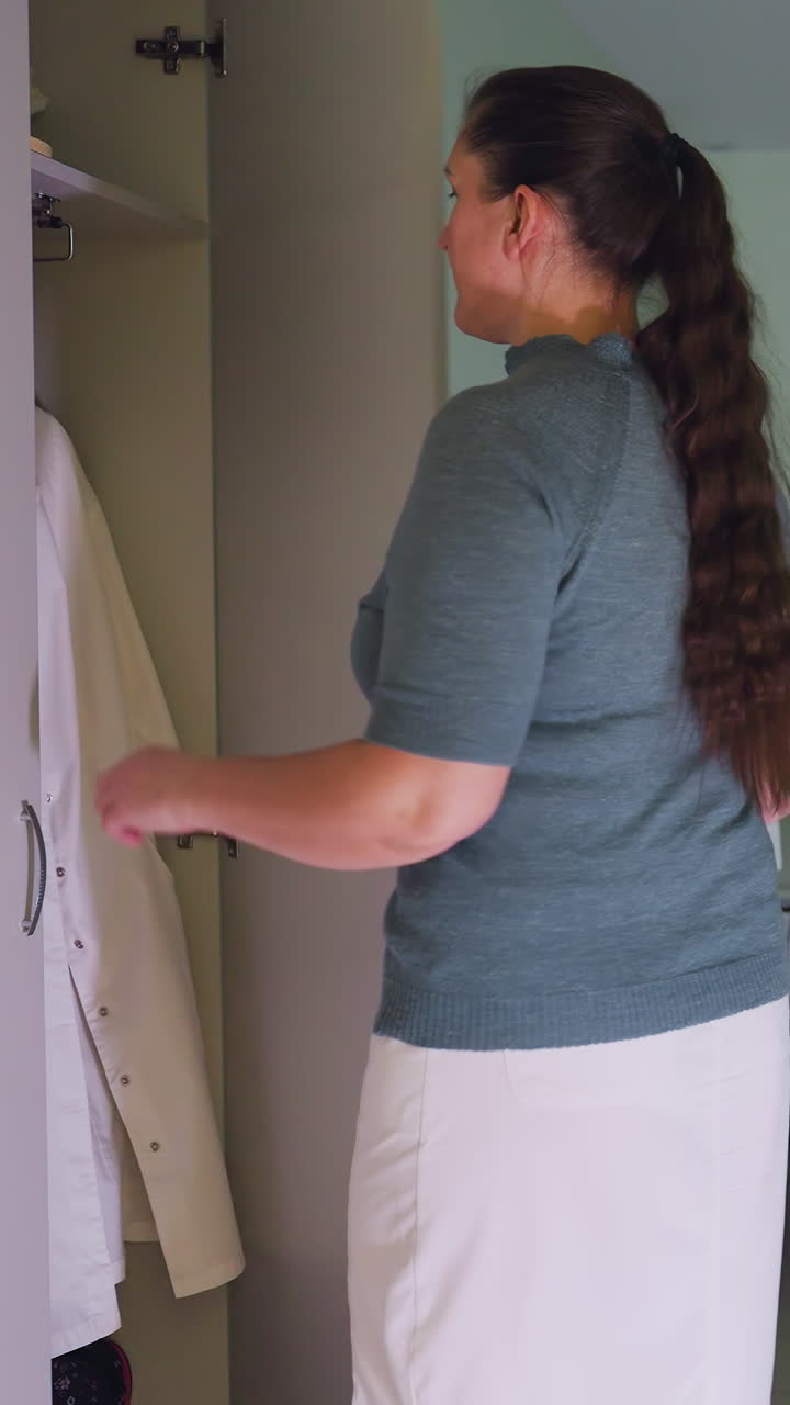 Calm ultrasound chamber filled with eager anticipation for treatments, Nurse prepares diligently in quiet sterile environment for upcoming medical procedures with careful attention