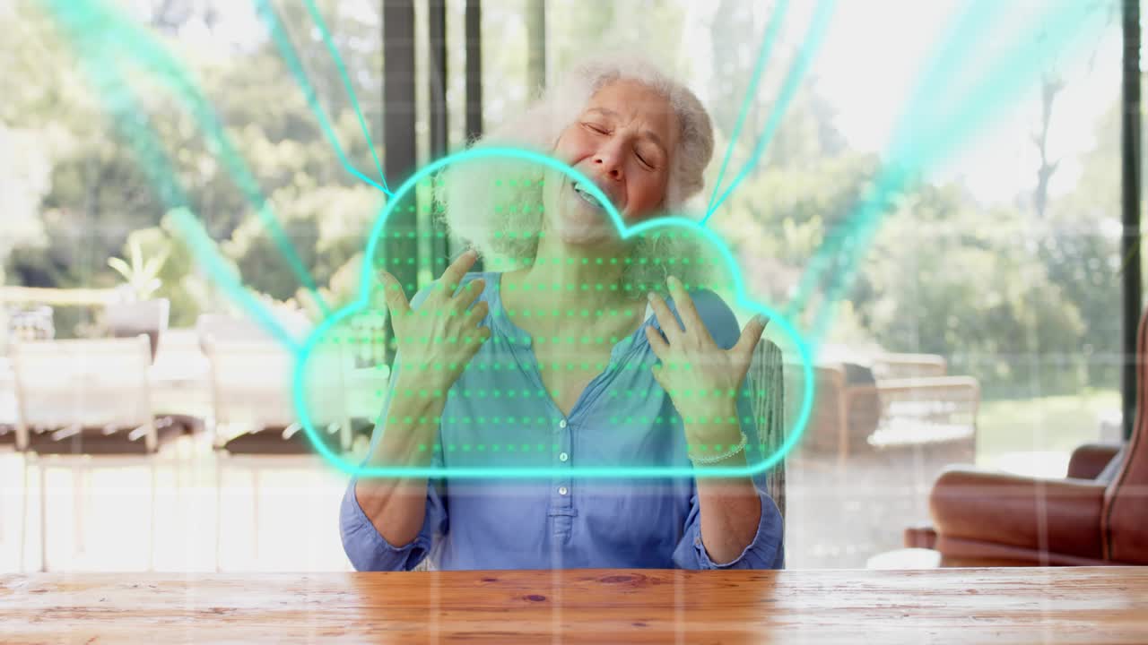 Woman lowering hands and speaking at table, gesture initiating HUD cloud animation for health demo