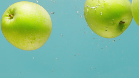 Green Apples Underwater Splash