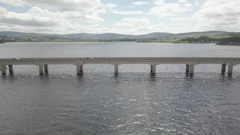 aerial view of the bridge over blessington lake county wicklow in ireland - drone shot