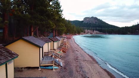 aerial of summer cabins and cabanas lining the shores of a resort at lake tahoe nevada