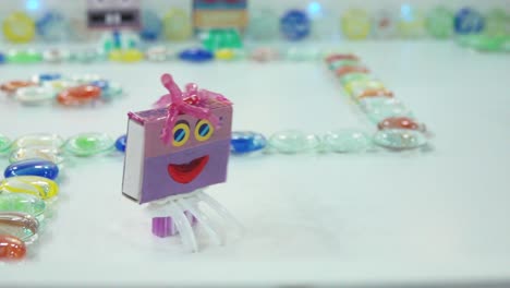 handmade matchbox girl toy with colored beads