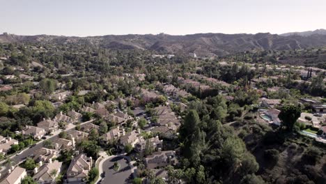 calabasas california luxurious upscale hillside neighbourhood homes aerial rising view