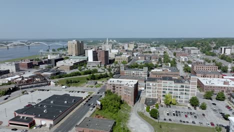 downtown davenport, iowa with drone video moving in wide shot