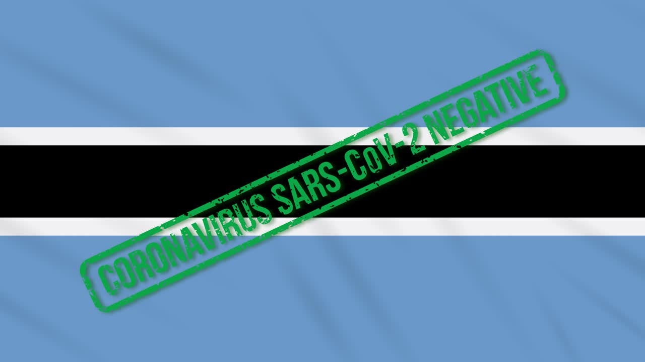 보츠와나가 코로나 바이러스로부터의 자유의 녹색 스프를 가진 발을 흔들고 있습니다.