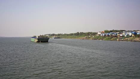 Transportation-boat-with-floating-village-on-the-back