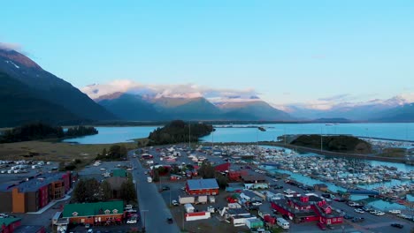 4k drone video of boats and ships in port valdez in valdez, ak during sunny summer day