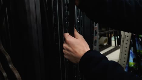 man buying construction materials for making racks or furniture at store 4k