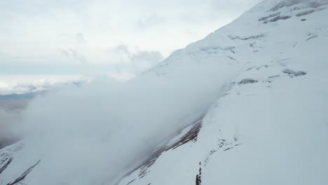 Aerial-View-of-Avalanche-on-Cotopaxi-Volcano-and-Glacier,-Highlands-of-Ecuador---Drone-Shot