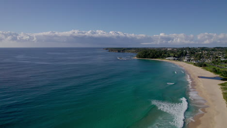 aerial drone view of mollymook beach near ulladulla, nsw. crystal-clear turquoise water and clean shoreline highlight the natural beauty of australia’s south coast.