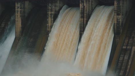 water flowing from open gates of dam at madikheda dam , shivpuri, madhya pradesh