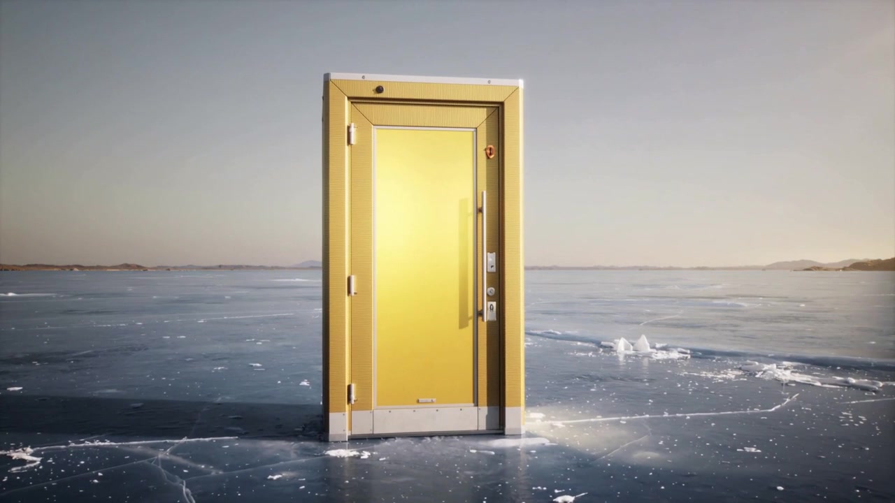 Shifting low sun creating reflections on freestanding gold door at frozen lake, with handle visible