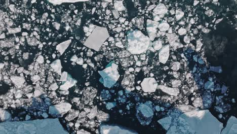 drone over sea and ice of ilulissat icefjord