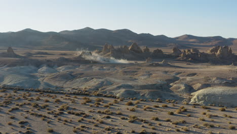 dust collecting in the desert from a camping site in front of the pinnacles