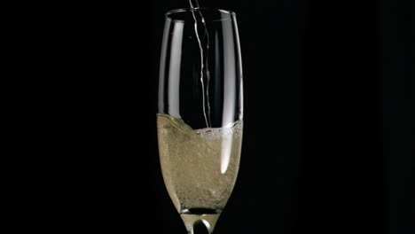 champagne poured in super slow motion