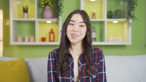 portrait of asian young woman approving and accepting. listening to news and announcements.