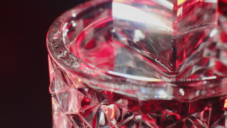 close-up of a cocktail glass with ice