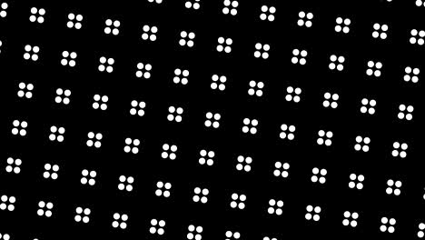 graphic pattern in black and white with stroboscopic and hypnotic effect, while rotating clockwise and increasing in size.