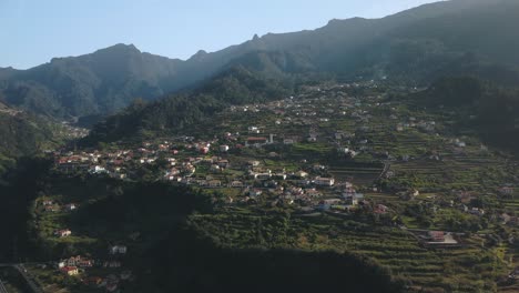 Drone-view-of-hills-and-residential-areas-on-Madeira-island,-Portugal